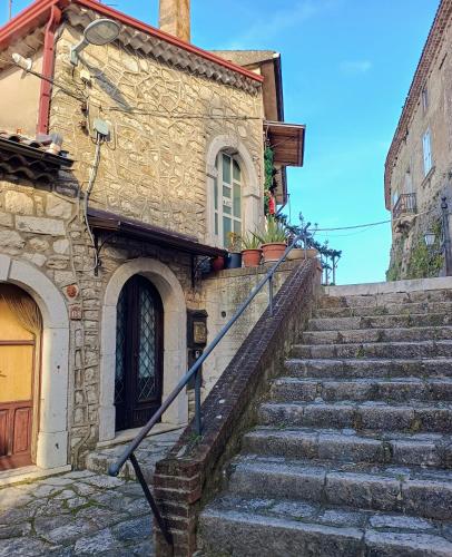 a set of stairs leading up to a building at Parva Domus in Campolattaro