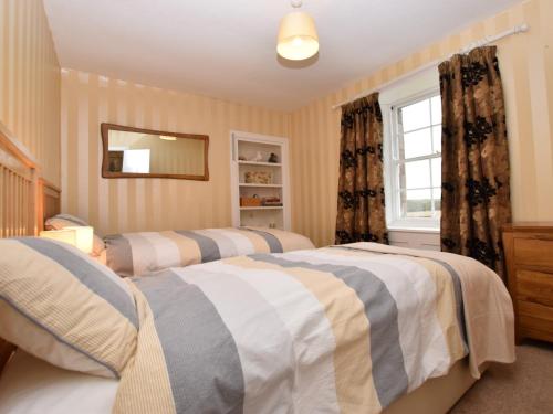 Ένα ή περισσότερα κρεβάτια σε δωμάτιο στο 5 bed in Chirnside 77337
