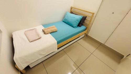 Postel nebo postele na pokoji v ubytování Condo Ioi City Mall Putrajaya, 3 & 2 Bedrooms, near to Hospital Serdang, UPM, Uniten