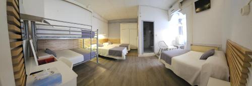 Cama o camas de una habitación en Hotel Palermo