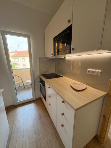 Kuchyň nebo kuchyňský kout v ubytování Apartmán Bellevie