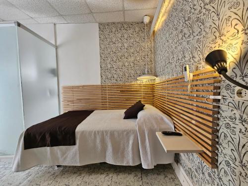 Cama o camas de una habitación en Hotel Palermo