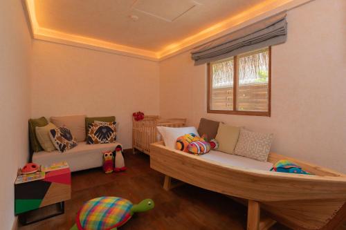 Χώρος καθιστικού στο Six Senses Kanuhura