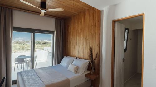 Postel nebo postele na pokoji v ubytování Sundunes Hotel Naxos