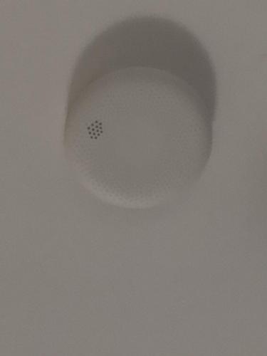 a white bowl with a drain in the ceiling at Short Lets Vacanze "Massimo" in Trappeto
