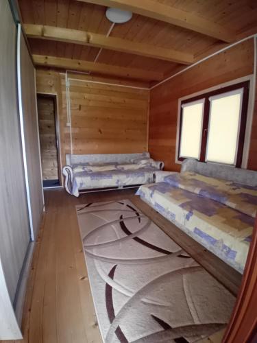 Postel nebo postele na pokoji v ubytování Vila Omeragic