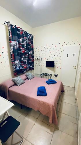 Postel nebo postele na pokoji v ubytování Nel Cuore di Faenza