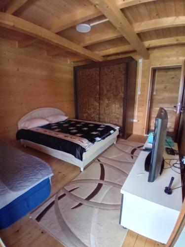 Postel nebo postele na pokoji v ubytování Vila Omeragic