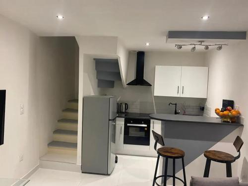 Nhà bếp/bếp nhỏ tại Maison accueillante à Trèbes avec 2 chambres