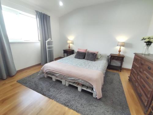 Postel nebo postele na pokoji v ubytování Casa da Lameira