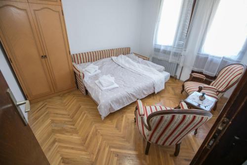Кровать или кровати в номере Apartmani Rosica