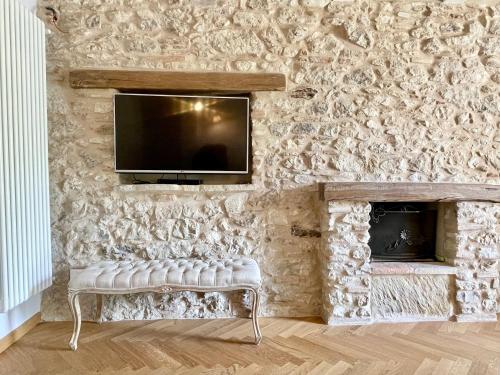 TV a/nebo společenská místnost v ubytování Residenza della vigna