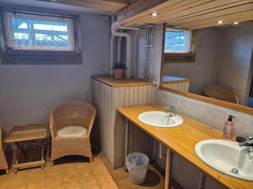 a bathroom with a sink and a mirror at Prästgården i Funäsdalen in Funäsdalen