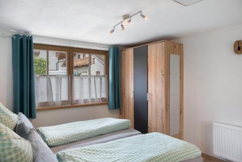 Ferienwohnung Wankblickにあるベッド