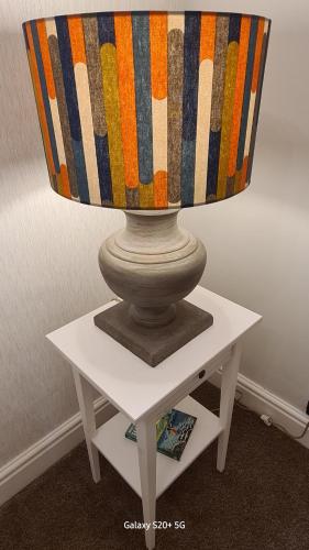 a lamp on top of a white table at Quakers Field View in Pennington