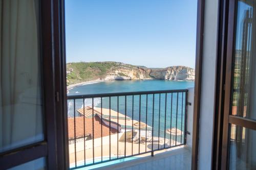 a view of a beach from a window at Felix Hotels - Hotel La Baja in Santa Caterina