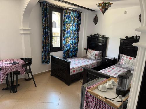Un ou plusieurs lits dans un hébergement de l'établissement Casa HÔTEL PEDRO