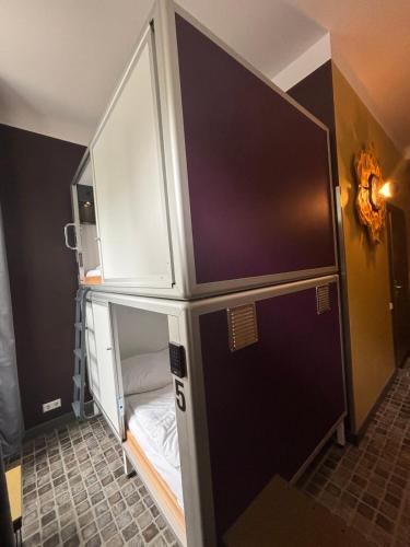 Un ou plusieurs lits dans un hébergement de l'établissement Sunflower Hostel Berlin