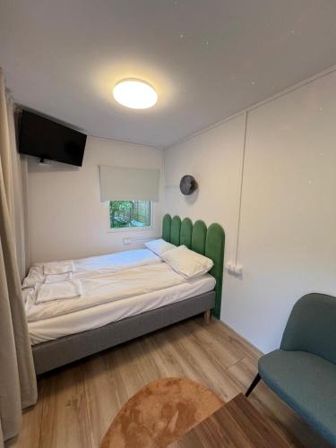 Katil atau katil-katil dalam bilik di Na Skraju Lasu Domek na Drzewie & Glamping