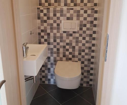 Ein Badezimmer in der Unterkunft Apartmány Stachy Popelná