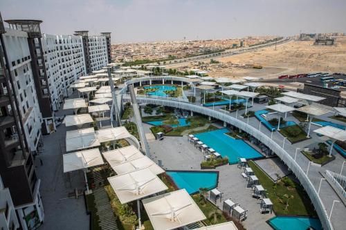 Bazén v ubytování Porto New Cairo Luxury Serviced Apartments nebo v jeho okolí
