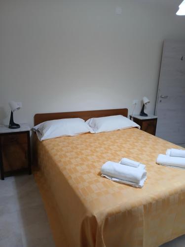 Ένα ή περισσότερα κρεβάτια σε δωμάτιο στο B&B La cascina dei sogni