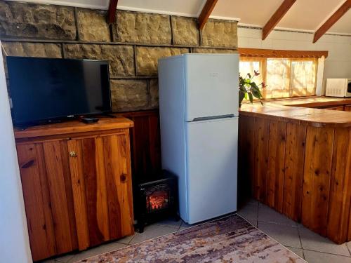 Una cocina o zona de cocina en Sandstone Escape Guesthouse