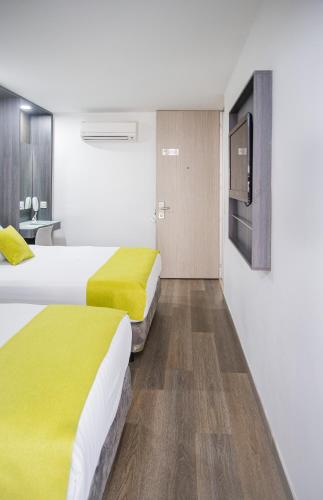 Eco Star Hotelにあるベッド