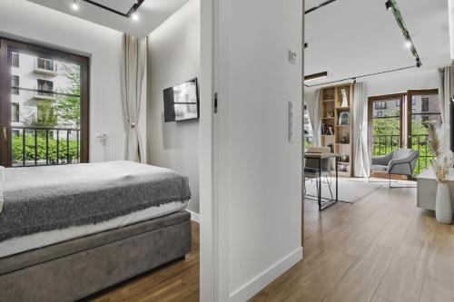 Ένα ή περισσότερα κρεβάτια σε δωμάτιο στο Luxury 2-room apartment in Praga-Północ Port Praski