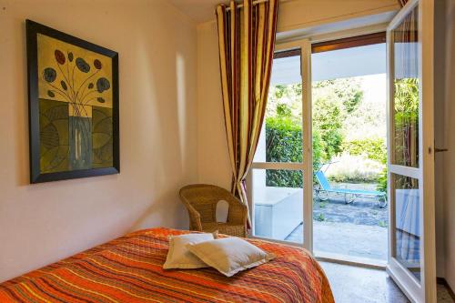 Ένα ή περισσότερα κρεβάτια σε δωμάτιο στο Casa Magnolia
