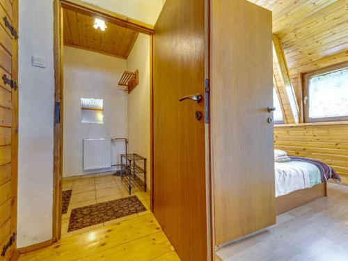 a room with a door leading to a bedroom at Apartment Kotarz View by Interhome in Brenna