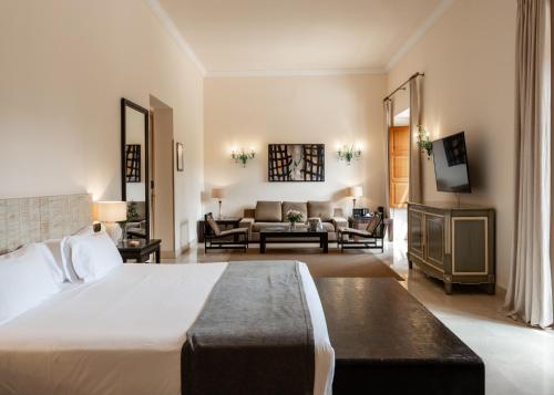Ένα ή περισσότερα κρεβάτια σε δωμάτιο στο Son Julia Country House & Spa