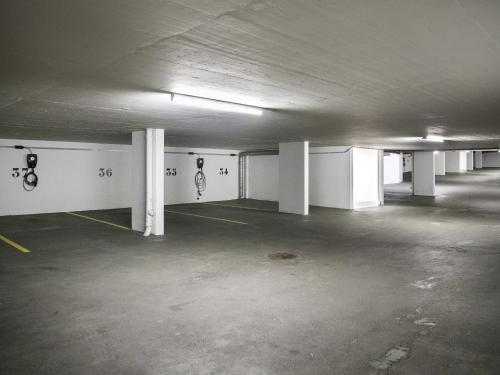 an empty parking lot with a parking lot at Apartment La Siala Apt-56A by Interhome in Falera