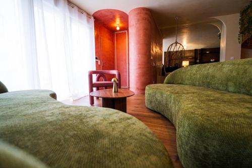 Posezení v ubytování Triplex Design avec Rooftop et Salle Cinéma