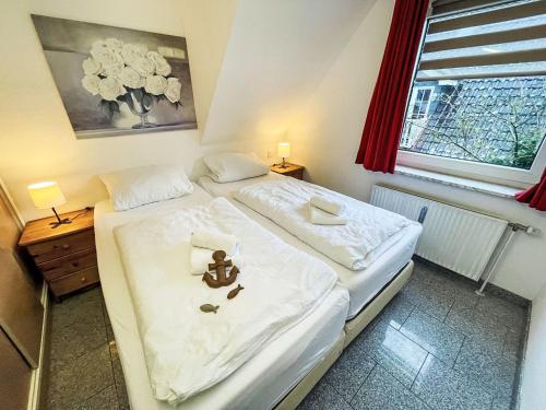 Ένα ή περισσότερα κρεβάτια σε δωμάτιο στο Apartment Fewo 3 in ruhigem Haus by Interhome