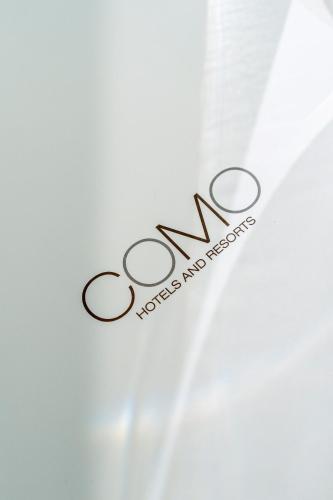 a close up of the wordova written on a white curtain at COMO Metropolitan London in London
