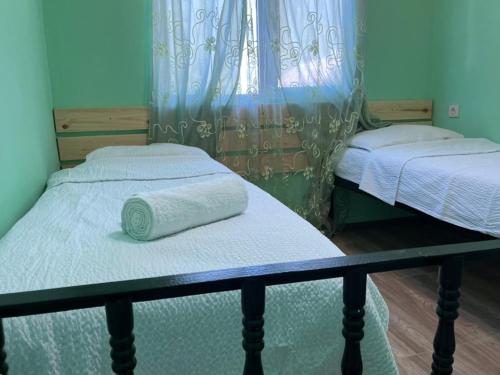 Giường trong phòng chung tại Apartment Roko