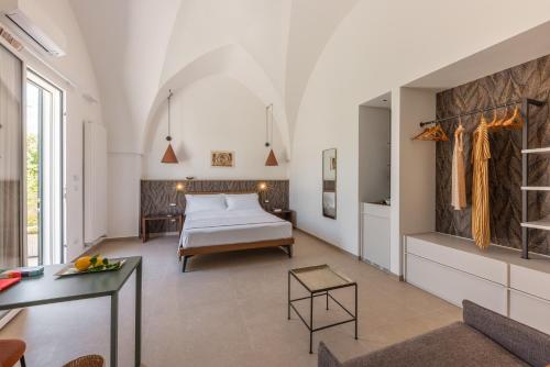 Ένα ή περισσότερα κρεβάτια σε δωμάτιο στο Lavilla Suite & Relax