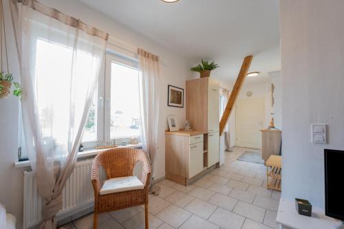 Ein Sitzbereich in der Unterkunft Reiterhof an der Nordsee