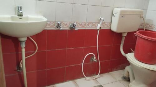 Koupelna v ubytování Sharada KK Residency