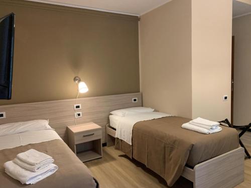 Postel nebo postele na pokoji v ubytování St Martin House