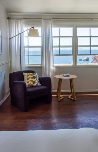 a living room with a couch and a table at Lookout At Trinidad Bay in Trinidad