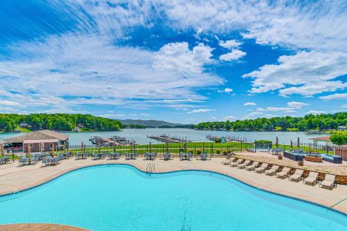 an aerial view of a resort with a pool and a marina at Steps to Smith Mountain Lake Unit with Pool Access! in Huddleston