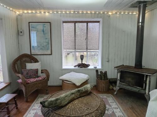 Ένα ή περισσότερα κρεβάτια σε δωμάτιο στο Huilo-Huilo Cabaña Huilin