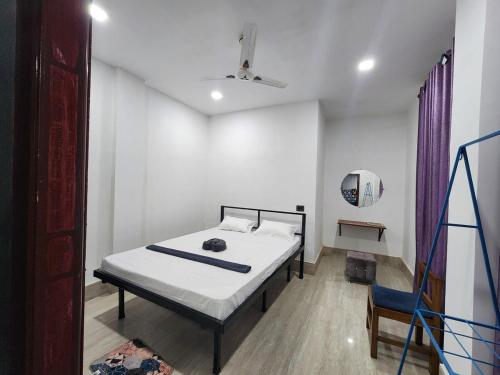 Katil atau katil-katil dalam bilik di Aqualeaf Villa's