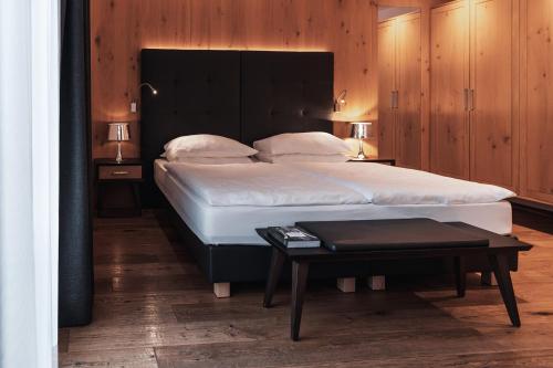 Postel nebo postele na pokoji v ubytování Hotel Ciasa Soleil