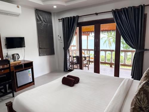 Postel nebo postele na pokoji v ubytování Bounty Resort