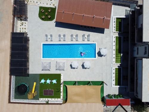 Πισίνα στο ή κοντά στο Stork Holiday Apartments - Garden & Sea View