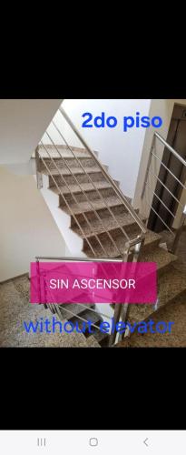 a staircase in a building with a sign on it at Las Jarcias 2C in Moncófar