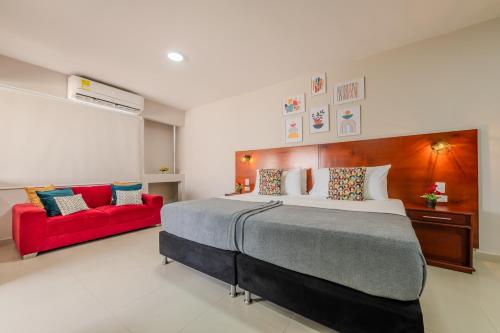 Postel nebo postele na pokoji v ubytování Hostel Dorado Plaza Getsemaní